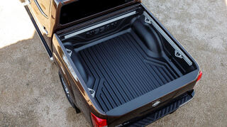 <p>mid Nürburg - Die Ladepritsche des Nissan Navara ist riesig und funktional gestaltet.</p>