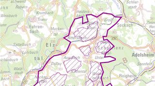 Die Karte zeigt violett umrandet das Projektgebiet „Rebhuhnschutz Schefflenztal“ mit den sieben Kernzonen (schraffiert).
