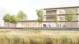 Blick von der Kopernikusstraße Richtung Vorplatz und Haupteingang der neuen Grundschule.