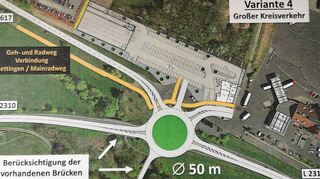 Die graue Fläche stellt das zukünftige Norma-Gelände mit Discounter (linkes Gebäude) und Frischemarkt dar – hier die Variante Kreisverkehr-Anschluss.
