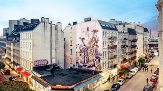 Im Portugiesenviertel hat der australische Fassadenkünstler Fintan Magee Friedrichs Gemälde auf 200 Quadratmeter Hausfassade frei interpretiert.