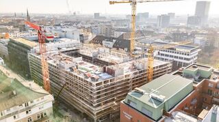 Menschen aus 60 Nationen arbeiten bei der Diringer & Scheidel-Gruppe. Hier die Baustelle des Projekts New Seven in der Mannheimer Innenstadt.