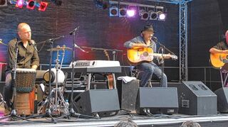 <p>Bayerisch-kölsches Trio: Martin Kälberer, Wolfgang Niedecken und Werner Schmidbauer in Wertheim.</p>